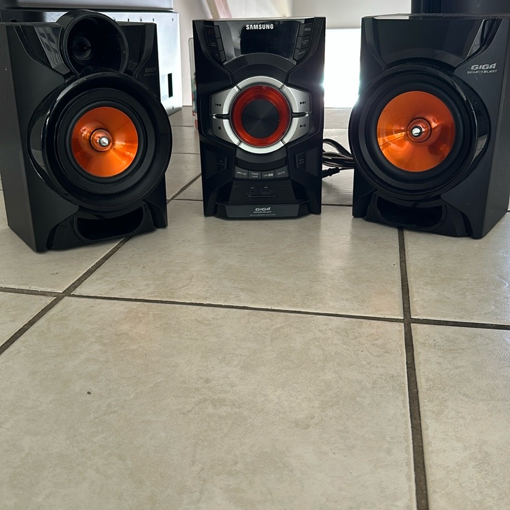 Samsung Black and Orange Portable Speakers with Modern Design